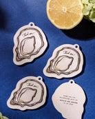 Ink Wash Oyster Favour Tag styled photograph