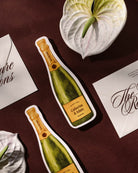 Watercolour Champagne Bottle Save the Date styled photograph